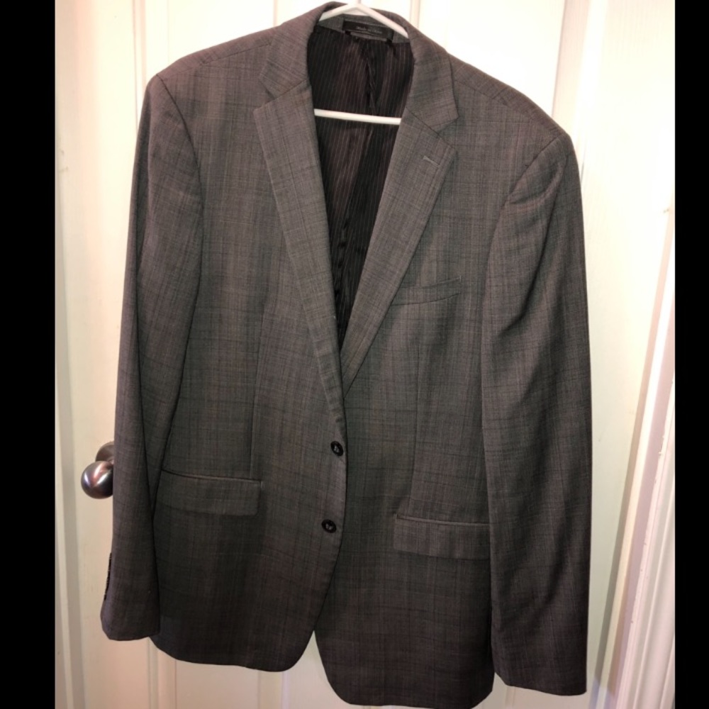 Light grey plaid Calvin Klein suit.